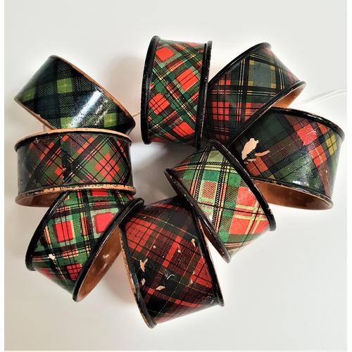 176 - EIGHT TARTANWARE NAPKIN RINGS
marked Prince Charlie, Caledonia, MacLean, McBeth and Gordon (8)