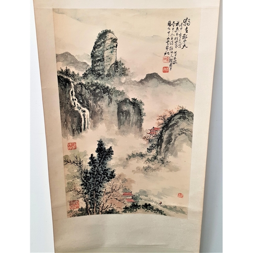 178 - 20th CENTURY JAPANESE SCROLL
depicting two remote houses in the countryside with a waterfall in the ... 