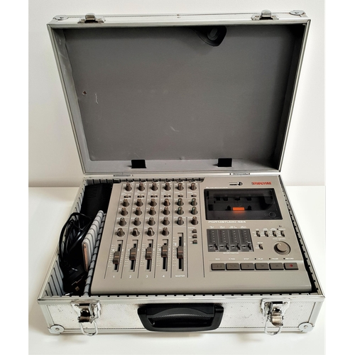 254 - TASCAM PORTASTUDIO 424
four track cassette recorder, with power lead, serial number 481079, in an al... 