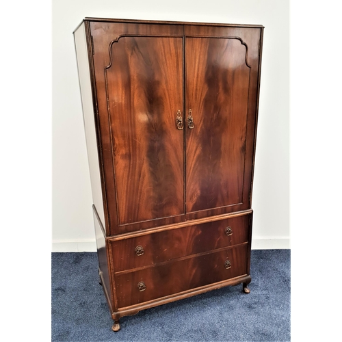 346 - BEITHCRAFT MAHOGANY COMPACTUM
with a pair of panelled doors opening to reveal a shelved interior wit... 