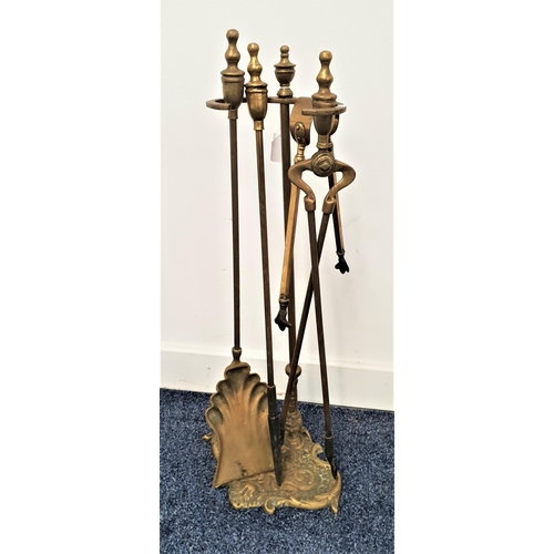 356 - BRASS COMPANION SET
comprising a poker, shell shaped shovel and a pair of tongs, all with an urn fin... 