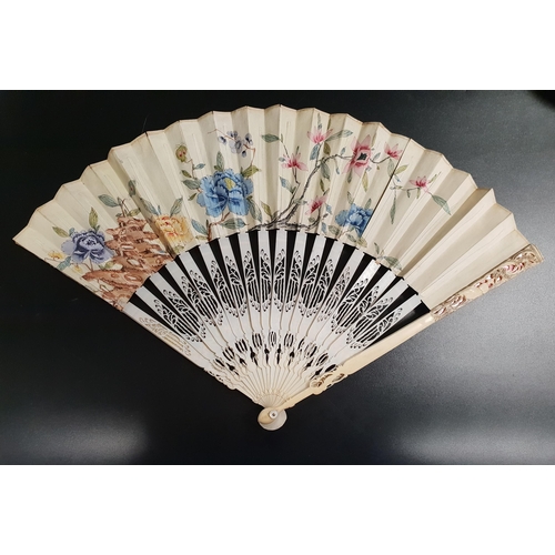 197 - EARLY 19th CENTURY IVORY STICK FAN
with pierced and painted sticks, the paper mount decorated with t... 