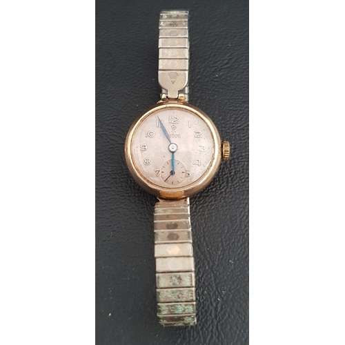 40 - LADIES NINE CARAT GOLD CASED TUDOR WRISTWATCH
the dial with Arabic numerals and subsidiary seconds d... 