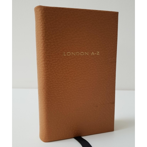 206 - SMYTHSON OF BOND STREET LONDON A-Z 
in tan leather with gilt edged pages