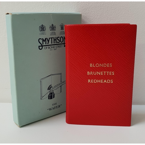 209 - SMYTHSON OF BOND STREERT WAFER NOTE BOOK
in red leather and tilted 'Blondes, Brunettes and Redheads'... 