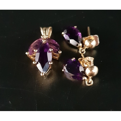 6 - AMETHYST SUITE OF JEWELLERY
comprising a pendant set with three marquise cut amethysts and a pair of... 