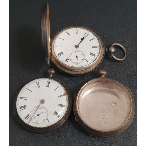 63 - TWO VICTORIAN SILVER CASED POCKET WATCHES
one a full hunter and the other open faced, both with Roma... 