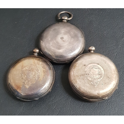 63 - TWO VICTORIAN SILVER CASED POCKET WATCHES
one a full hunter and the other open faced, both with Roma... 