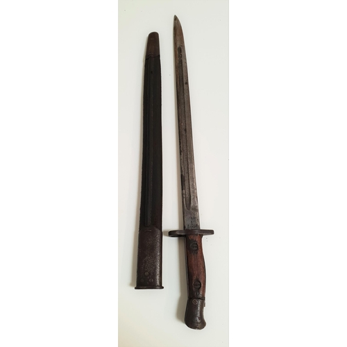 292 - WWI BAYONET
with a steel fullered blade marked Remington 1907 10.16, with crown cypher and a wooden ... 