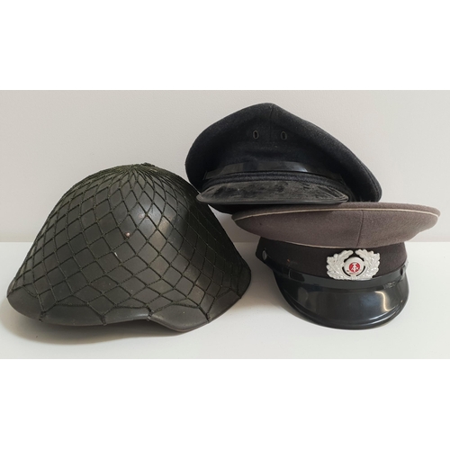 317 - EAST GERMAN OFFICERS CAP
in grey felt, marked to the interior NVA57 1856Y, an East German military h... 