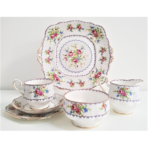 135 - ROYAL ALBERT TEA SET
in the Petit Point pattern, comprising thirteen tea cups, twelve saucers, twelv... 