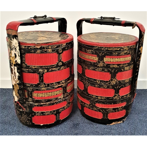 190 - PAIR OF LARGE CHINESE WEDDING BASKETS
each with four lidded compartments decorated with red and blac... 