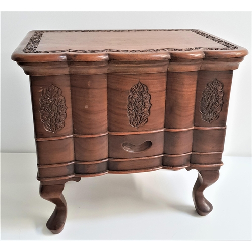 211 - TEAK SEWING BOX
with a carved and shaped lift up lid revealing a lift out tray with a storage compar... 