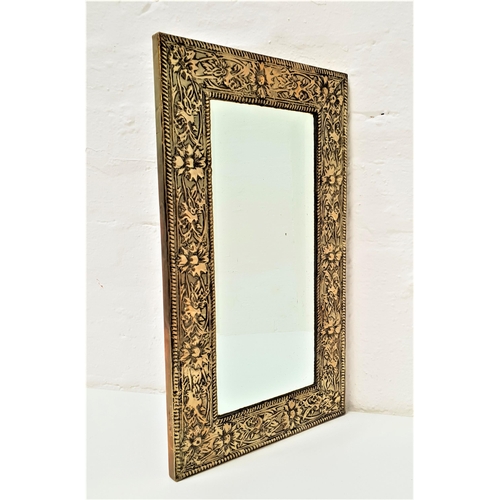 368 - RECTANGULAR WALL MIRROR
with a bevelled plate in a brass embossed frame, 49cm high