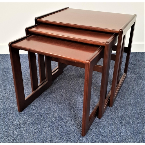 381 - G PLAN QUADRILLE NEST OF TEAK TABLES
with square tops standing on shaped supports, 49cm high