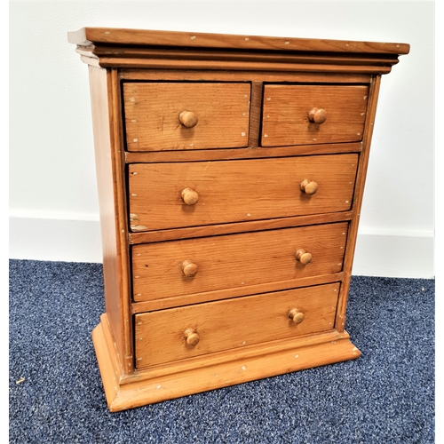 383 - SMALL PINE CHEST OF DRAWERS
with a rectangular top above two short and three long drawers, standing ... 