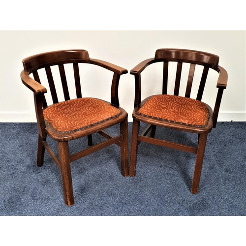 387 - PAIR OF ELM ELBOW CHAIRS
with hoop slat backs above stuffover seats with decorative stud detail, sta... 