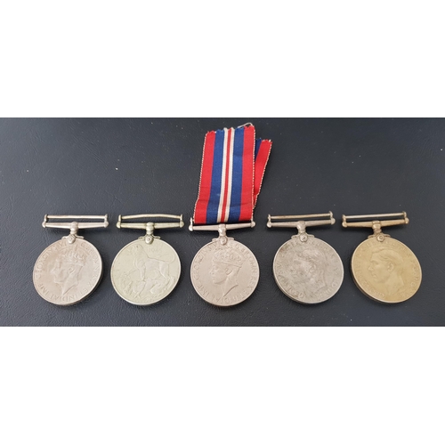 286 - FIVE GEORGE VI MEDALS
comprising two The Defence Medals and three 1939-45 War Medals, one with a rib... 