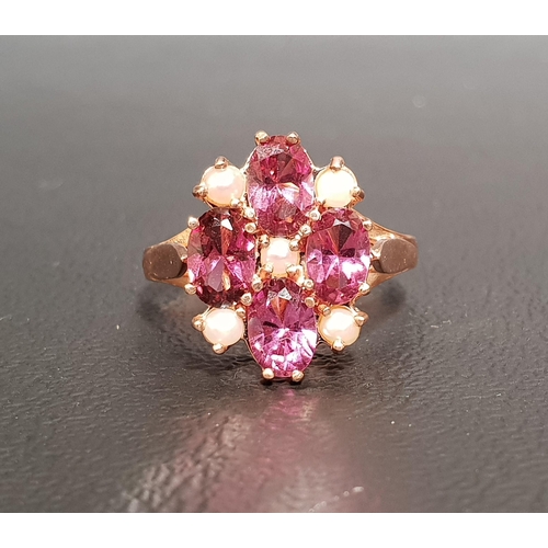 76 - RHODALITE GARNET AND SEED PEARL CLUSTER RING
the four oval cut garnets interspersed with seed pearls... 