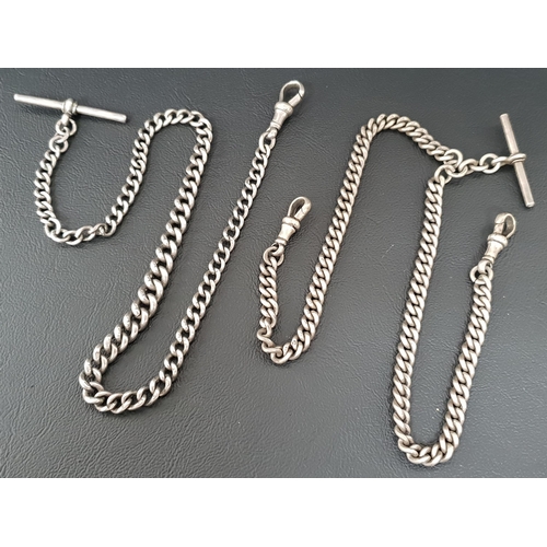 116 - TWO SILVER DOUBLE ALBERT CHAINS
both with T-bars, one weighing 36 grams and the other 29.1grams