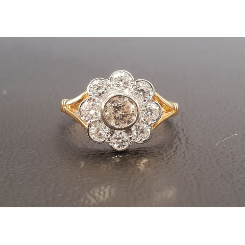 65 - IMPRESSIVE DIAMOND CLUSTER RING
the round brilliant cut diamonds totalling approximately 1.15cts, on... 