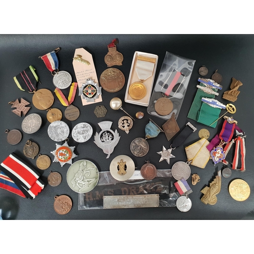 290 - SELECTION OF MILITARY MEDALS AND BADGES
including a Russian medal for military merit, German occupat... 