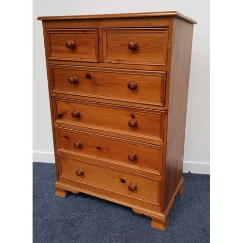 391 - WAXED PINE CHEST
with a moulded top above two short panelled drawers and four long panelled drawers,... 