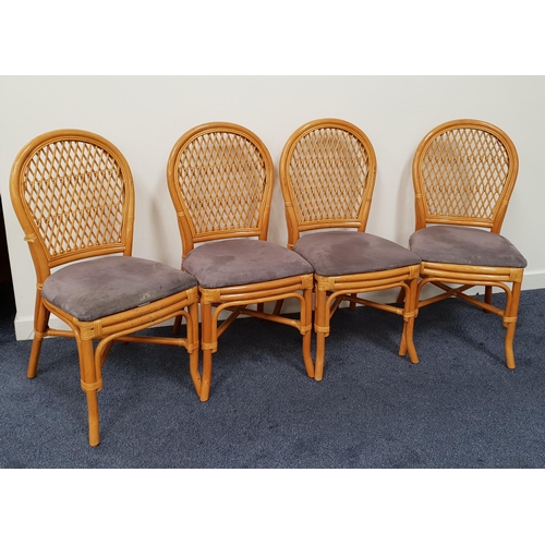 398 - SET OF FOUR CANED DINING CHAIRS
with arched lattice backs above shaped padded seats, standing on sha... 