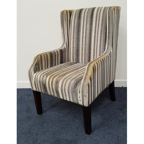 408 - MODERN ARMCHAIR
covered in a textured stripe material, standing on plain supports