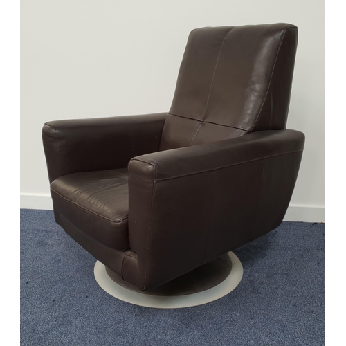 411 - LEATHER SWIVEL ARMCHAIR
in brown leather with a deep padded back, seat and arms, on a circular swive... 