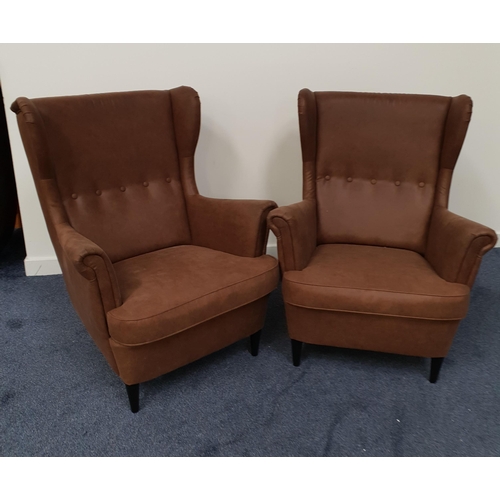 413 - PAIR OF RETRO STYLE WING BACK ARMCHAIRS
in brown leather effect with button backs, scroll arms and p... 