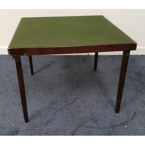 414 - CARD TABLE
with a baize top and folding legs, 76cm wide