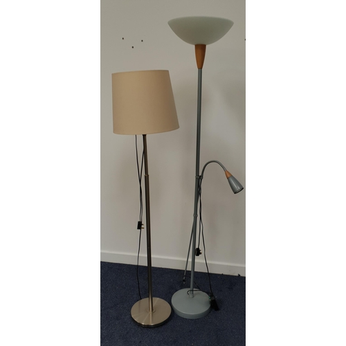 415 - GREY METAL STANDARD LAMP
raised on a circular base with a glass up-light shade and a separate adjust... 