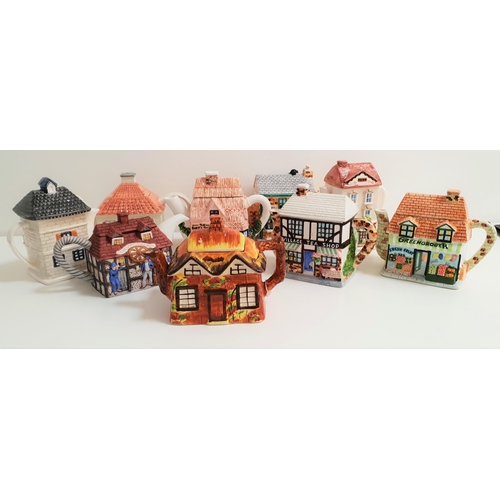 155 - NINE NOVELTY TEAPOTS
all in the form of cottages and other buildings, including The Baker's Shop, Vi... 