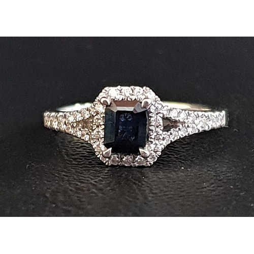 41 - SAPPHIRE AND DIAMOND CLUSTER RING
the central emerald cut sapphire approximately 0.4cts in diamond s... 