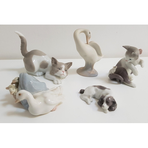 147 - FIVE LLADRO PORCELAIN FIGURINES
depicting a sleeping spaniel, 8cm long, cat and mouse at play, 8cm h... 