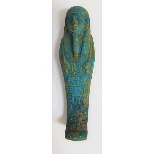 217 - EGYPTIAN SHABTI
with carved hieroglyphs to the lower half of the figure, 10.7cm high