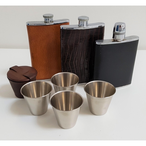 220 - THREE HIP FLASKS
two 8oz and one 6oz capacity and four stainless steel nip cups