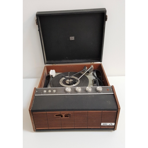 260 - HMV PORTABLE STEREO RECORD PLAYER
in a hard shell case