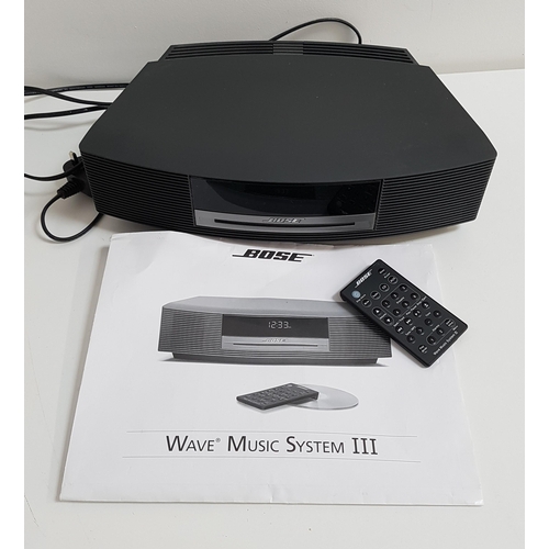 261 - BOSE WAVE MUSIC SYSTEM
with remote control and instructions