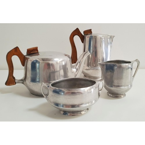 227 - PICQUOT WARE TEA SERVICE
comprising a tea pot, hot water jug, sugar bowl and milk jug (4)