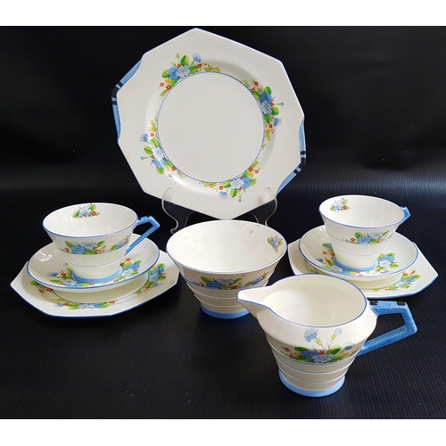 171 - ROYAL PARAGON TEA SERVICE
decorated with flowers and comprising cups and saucers, tea bowl, milk jug... 