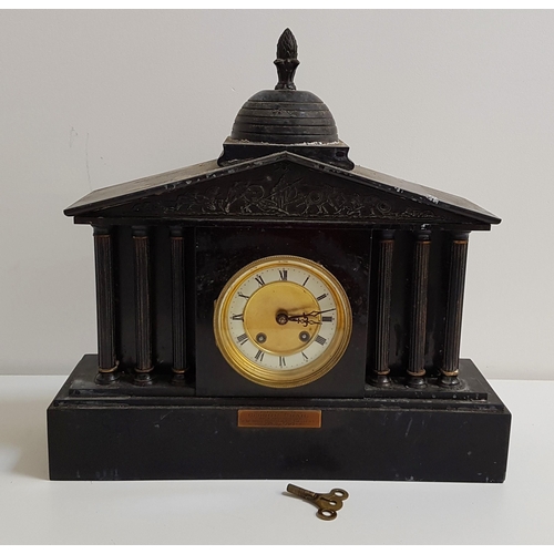 231 - LATE VICTORIAN BLACK SLATE MANTLE CLOCK
with a circular brass and enamel dial with Roman numerals an... 