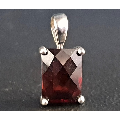 98 - GARNET PENDANT
the rectangular checkerboard cut garnet in unmarked white gold mount, 1.3cm high incl... 