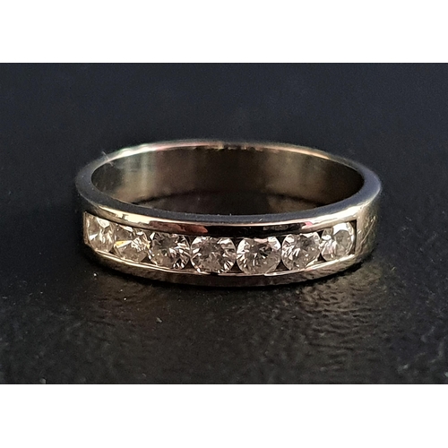 107 - CHANNEL SET DIAMOND HALF ETERNITY RING
the seven round cut diamonds totalling approximately 0.5cts, ... 