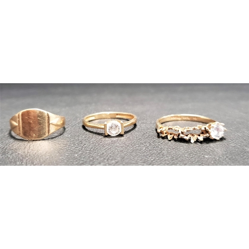 108 - THREE NINE CARAT GOLD RINGS
one a small signet ring and the other with set with CZ stone (other ston... 