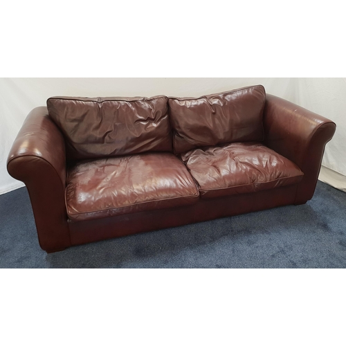 418 - LARGE LEATHER FOUR SEAT SOFA
in brown leather with loose back and seat cushions with scroll arms, st... 