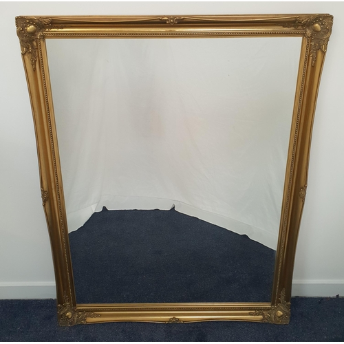 419 - LARGE RECTANGULAR WALL MIRROR
in a gilt frame with a plain plate, 106cm x 137cm