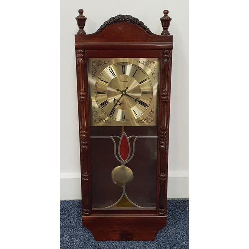 425 - EMPEROR REGULATOR STYLE WALL CLOCK
the brass dial with Roman numerals, in a mahogany case, 63.5cm hi... 