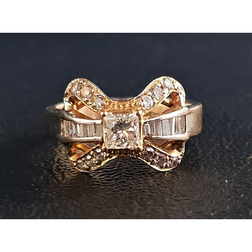 61 - UNUSUAL DIAMOND CLUSTER RING 
the multi diamonds in bow shaped setting totalling approximately 0.7ct... 